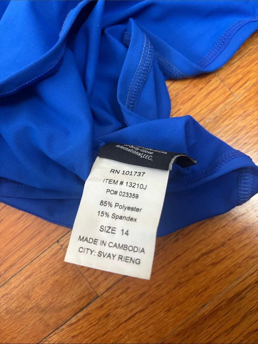 Body Glove blue and red rash guard tops